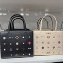 *YKL2142卡爾卡通釘釦手提包